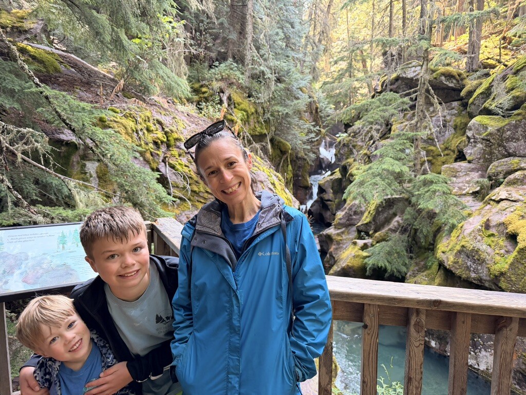 Family standing together on the Trail of the Cedars