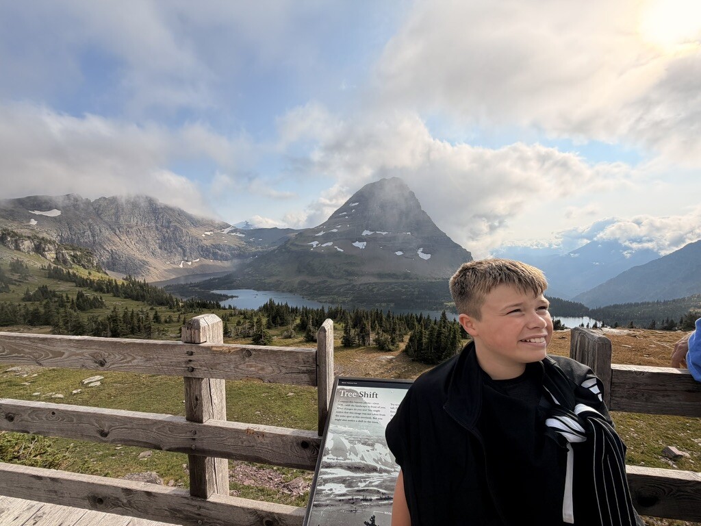 Family overlooking the mountains in Glacier National Park