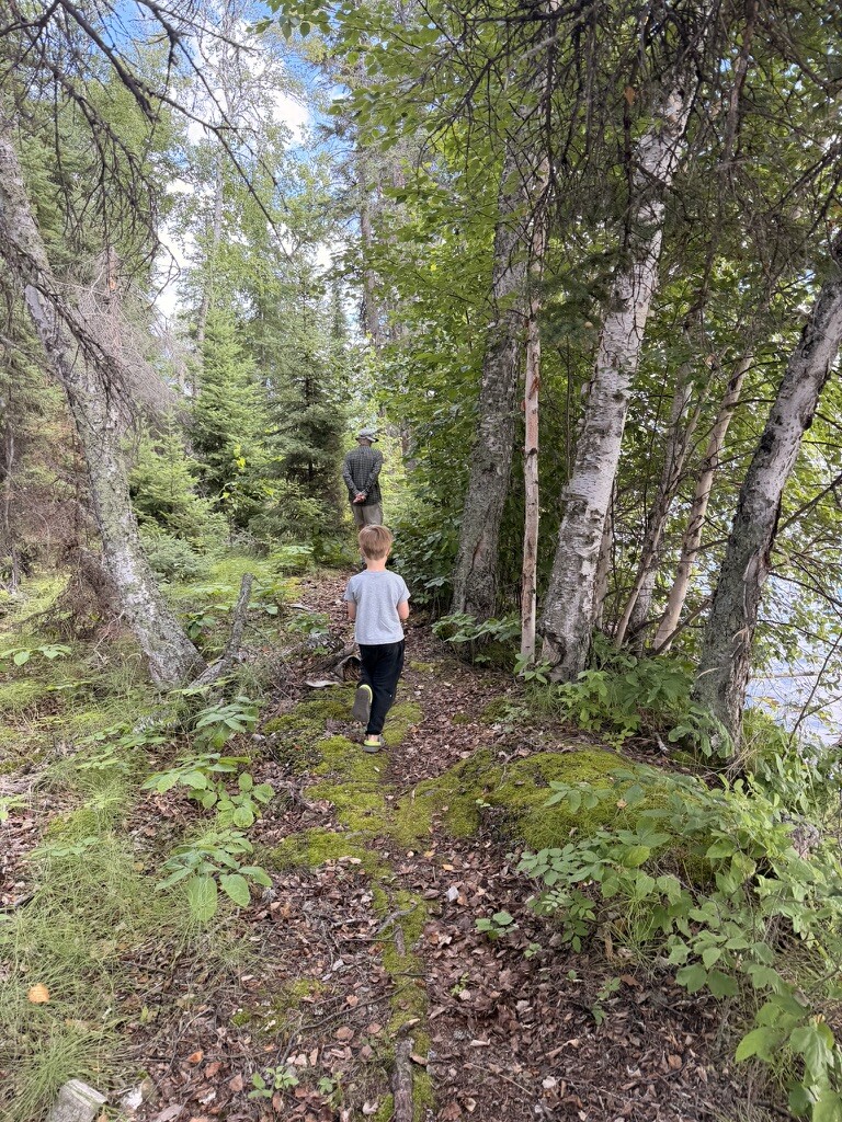 Douglas walking the wooded trail around Besnard Lake island