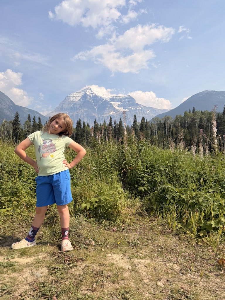 Maple posing with Mount Robson rising behind her