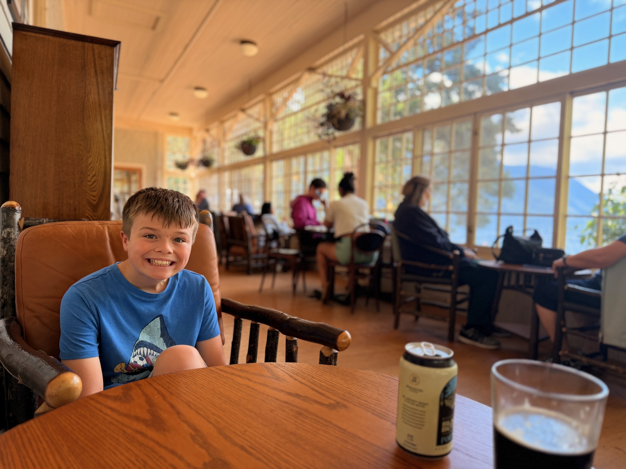 Birch seated in the sunroom at Lake Crescent Lodge