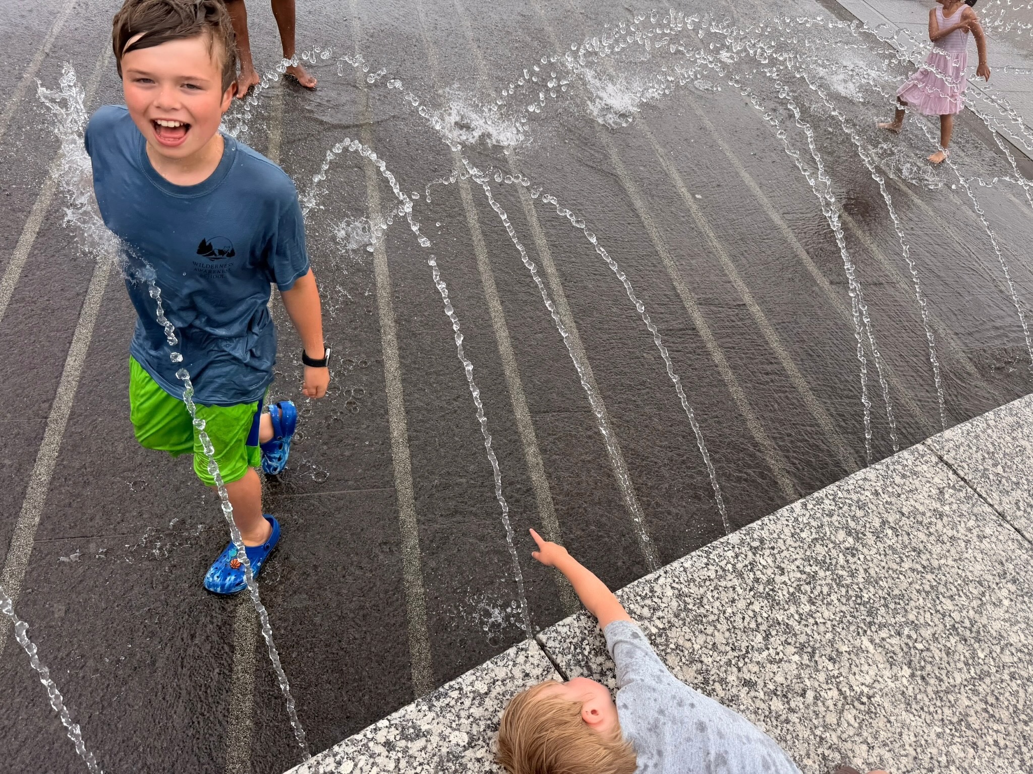 Children playing in the Georgetown waterfront splash park