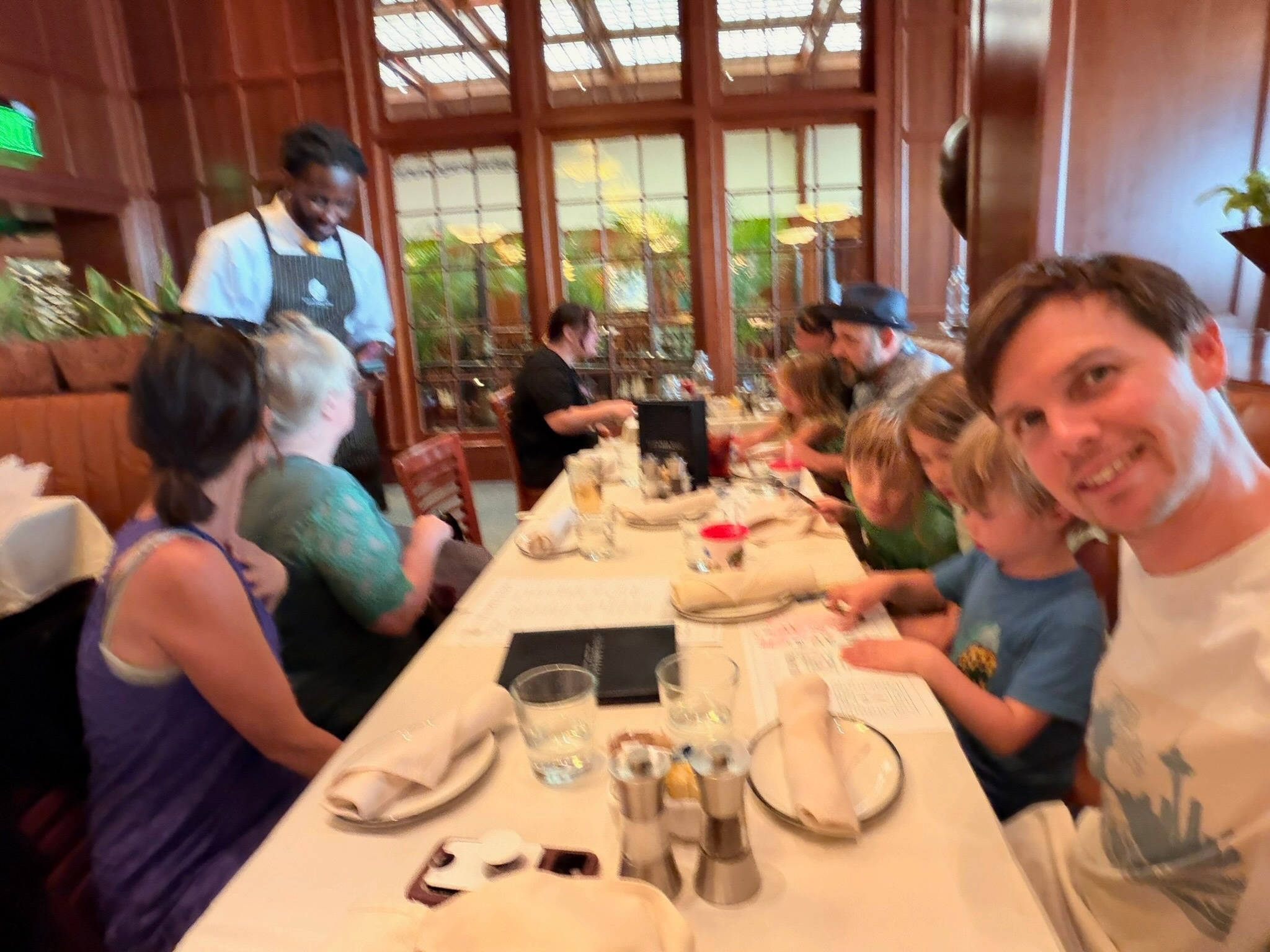 The family gathered around a long table at The Hamilton