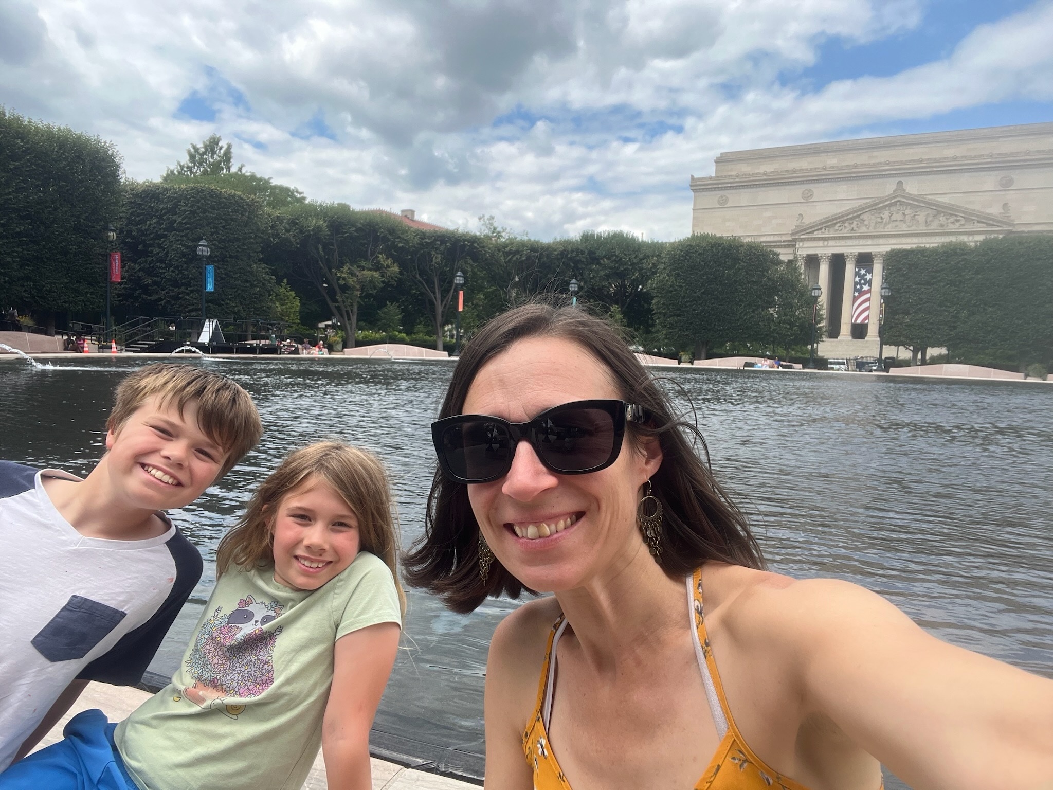 A family selfie beside the fountain in the National Gallery Sculpture Garden